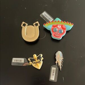4 assorted croc charms/jibbits